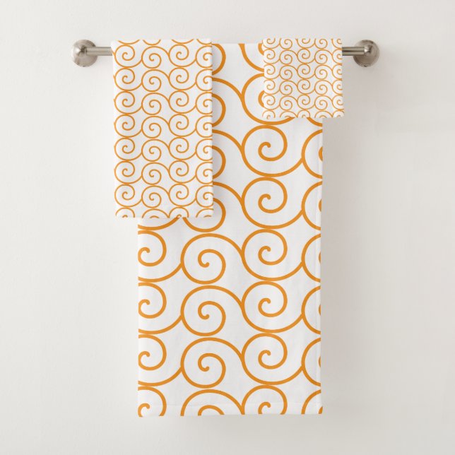 A brown and orange rug with a repeating pattern mo bath towel set (Insitu)