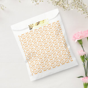 A brown and orange rug with a repeating pattern mo favour bags