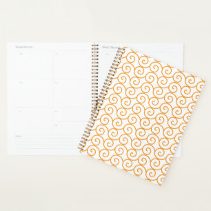 A brown and orange rug with a repeating pattern mo planner