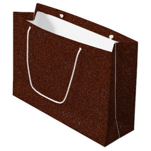A brown paper bag with a white handle
