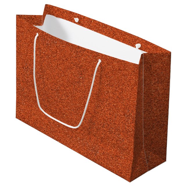 A brown paper shopping bag with a white handle (Front Angled)