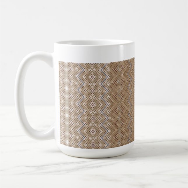 A brown rug displaying a symmetrical design featur coffee mug (Left)