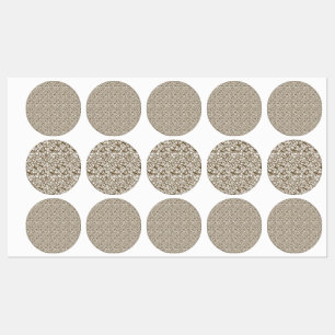 A brown rug with a geometric motif is partially co