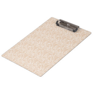 A brown rug with an intricate motif lies on the fl clipboard