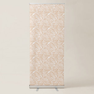 A brown rug with an intricate motif lies on the fl retractable banner