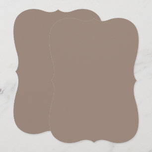 a brown wall with a clock on it