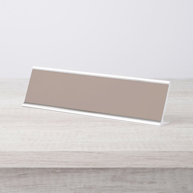 a brown wall with a clock on it desk name plate (Front)