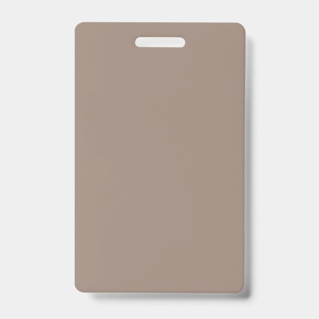 a brown wall with a clock on it ID badge (Front)