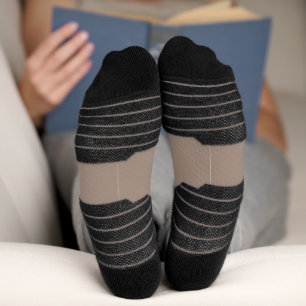 a brown wall with a clock on it socks