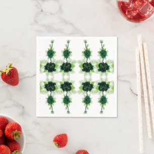 a bunch of green flowers on a white background napkin