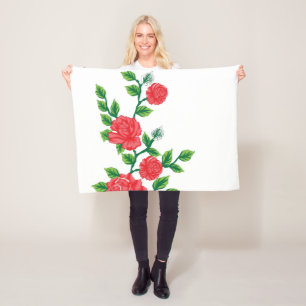 a bunch of red flowers on a white background fleece blanket