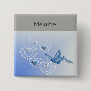 A butterfly and hearts 15 cm square badge