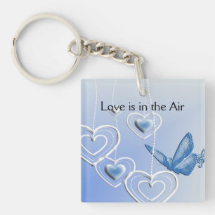 A butterfly and hearts key ring