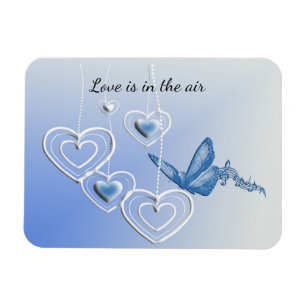 A butterfly and hearts magnet