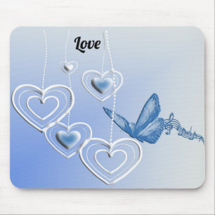 A butterfly and hearts mouse mat