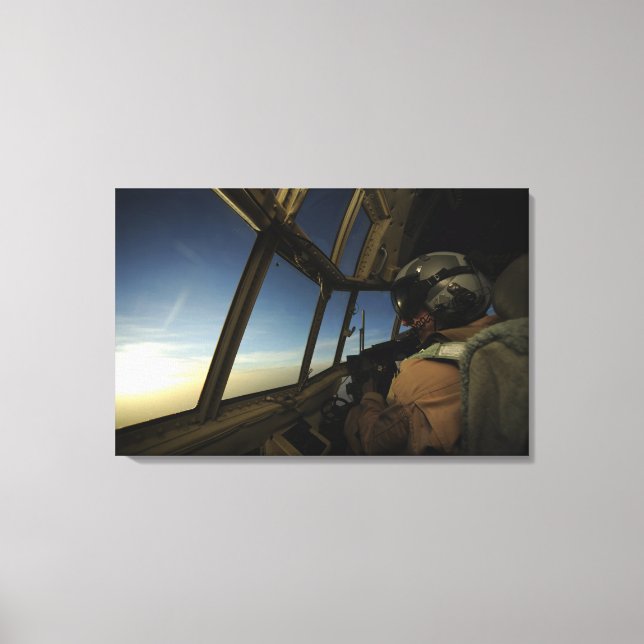 A C-130 Hercules pilot scans the horizon Canvas Print (Front)