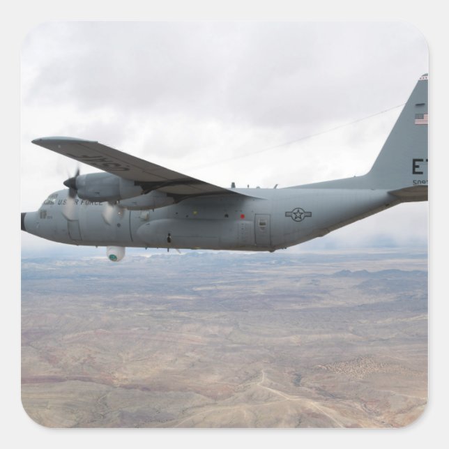 A C-130 Hercules soars through the sky Square Sticker (Front)