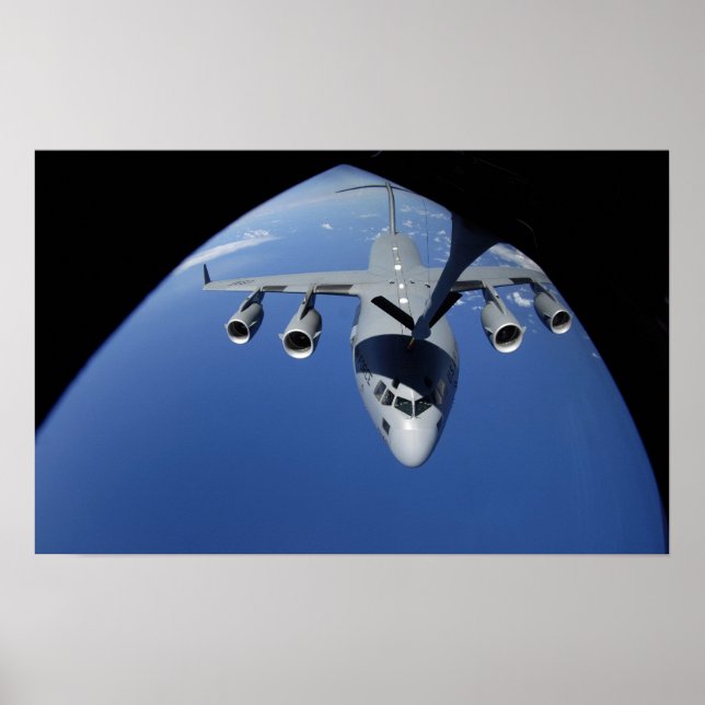 A C-17 Globemaster III receives fuel 2 Poster (Front)