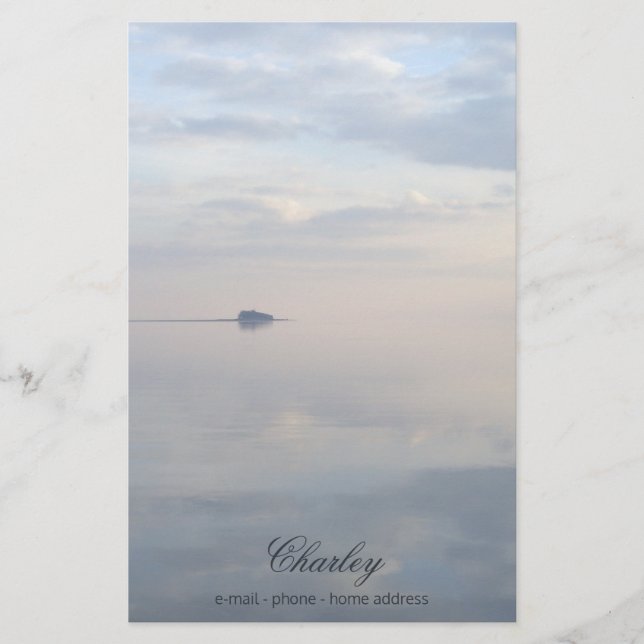 A calm sea, reflections and the island stationery (Front)