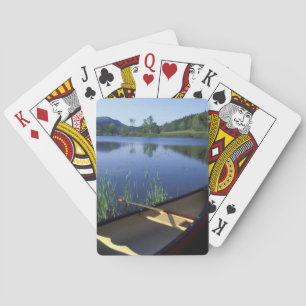 A canoe rests on the shore of Little Long Pond Playing Cards