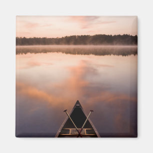 A canoe rests on the shore of Pawtuckaway Lake Magnet