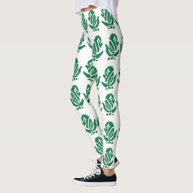 A captivating green and black design with a bold g leggings (Left)