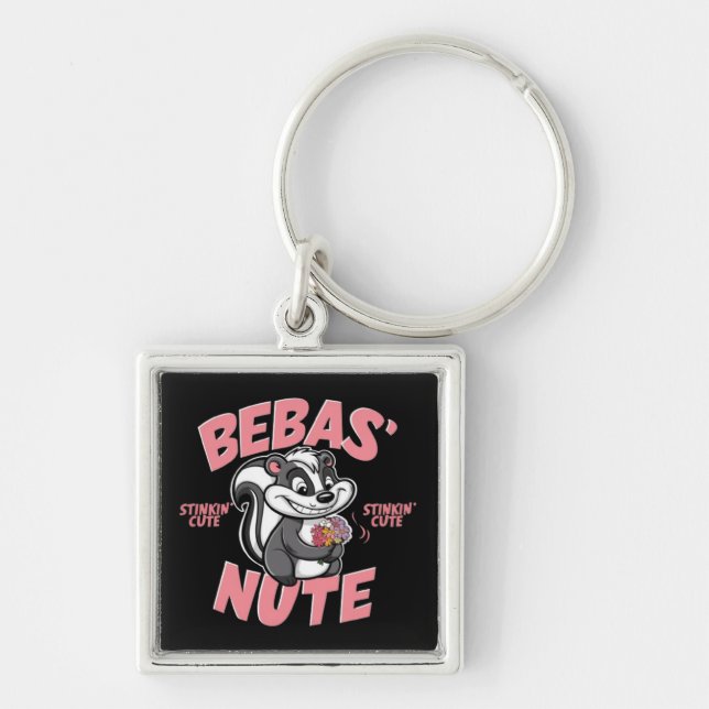 A cartoon skunk with a cheeky grin key ring (Front)