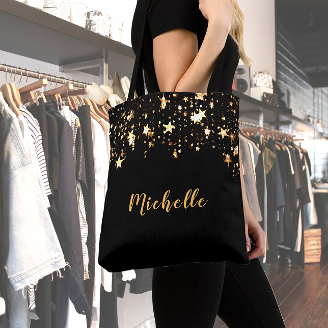A cascade of golden stars on black add name tote bag (Creator Uploaded)