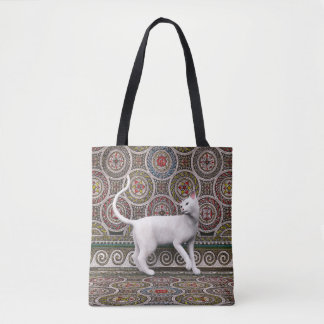 A cat on the mosaic tote bag