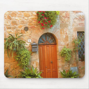 A cat seeks entrance to home in Pienza, Italy. Mouse Mat