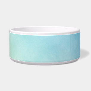 A ceramic bowl with a light blue marbled texture 