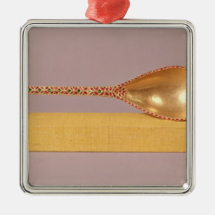 A ceremonial spoon metal tree decoration
