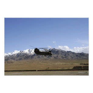 A CH-47 Chinook takes off Photo Print