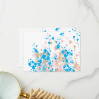 A charming arrangement of blue and pink flowers se