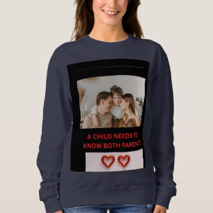 A CHILD NEEDS TO KNOW BOTH PARENTS SWEATSHIRT