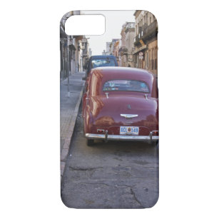 A classic old red Peugeot car parked on a street iPhone 8/7 Case