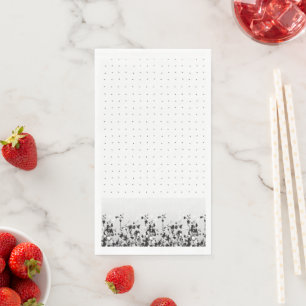 A clean white backdrop featuring tiny dots scatter napkin