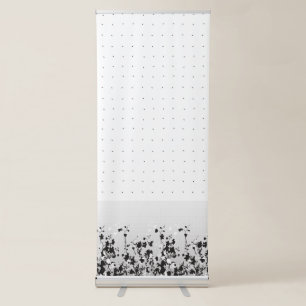 A clean white backdrop featuring tiny dots scatter retractable banner