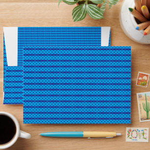 A clear blue sky stretches above a calm, deep blue envelope