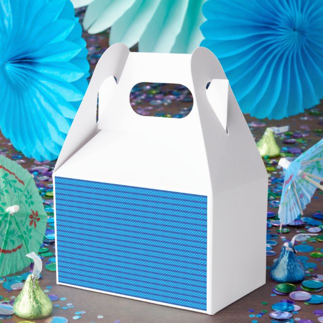 A clear blue sky stretches above a calm, deep blue favour box (Party)