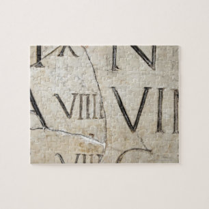 A close-up of ancient Roman letters on marble. Jigsaw Puzzle
