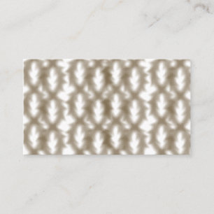 A close-up view of a crisscrossing wire mesh grid business card