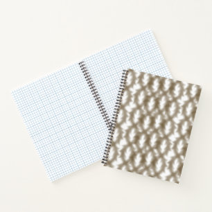 A close-up view of a crisscrossing wire mesh grid notebook