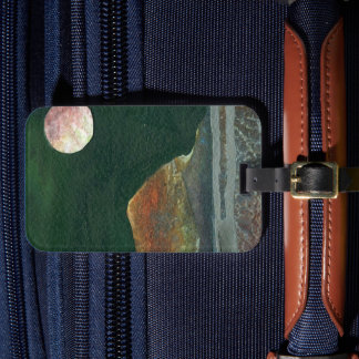 A close up view of fantasy worlds and their moons luggage tag