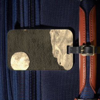 A close up view of fantasy worlds and their moons  luggage tag