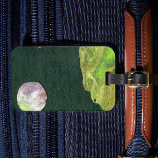A close up view of fantasy worlds and their moons  luggage tag