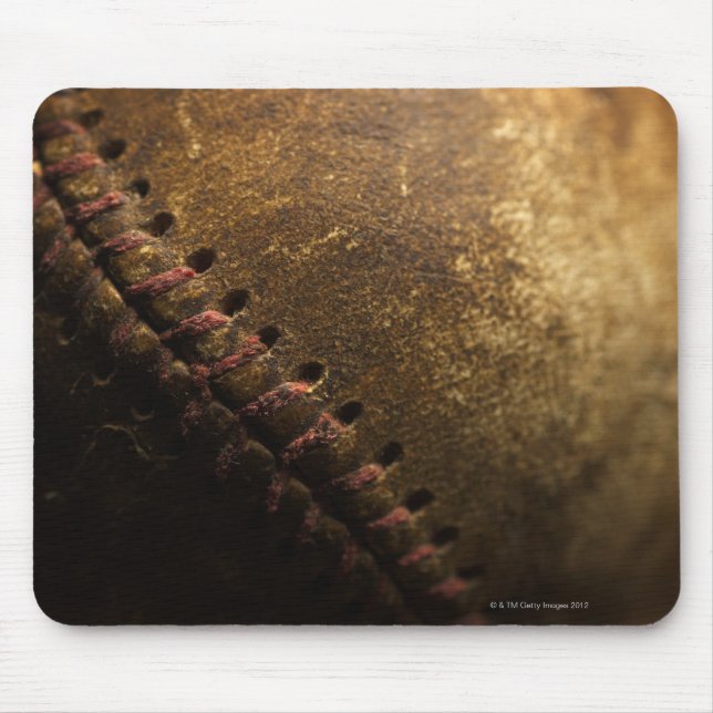 A closeup of an old baseball. Shot with shallow Mouse Mat (Front)