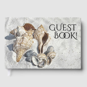 A Collection of Seashells on Sand Guest Book