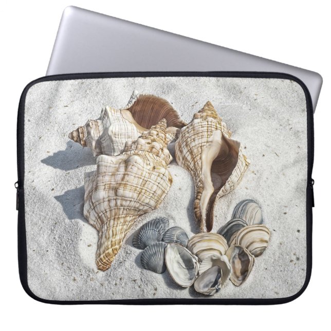 A Collection of Seashells on Sand Laptop Sleeve (Front)