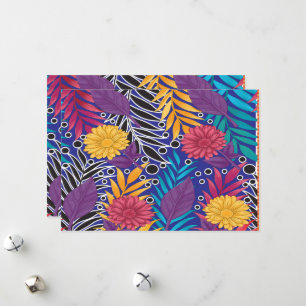 a colourful flower and leaves pattern on a blue ba holiday card